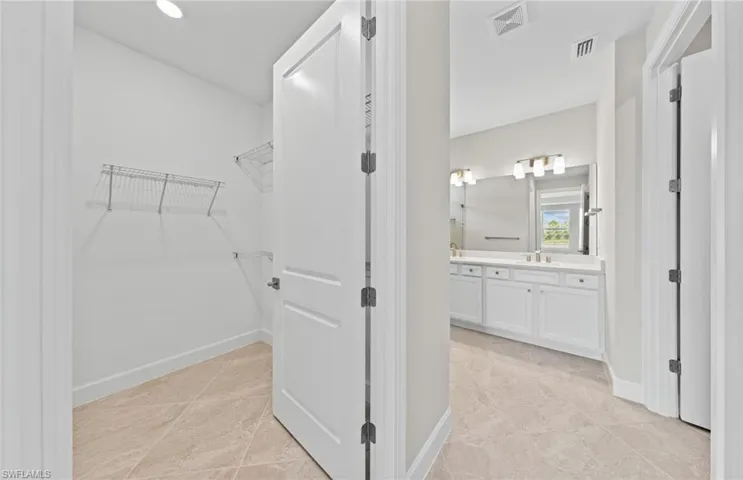 Walk in closet with sink
