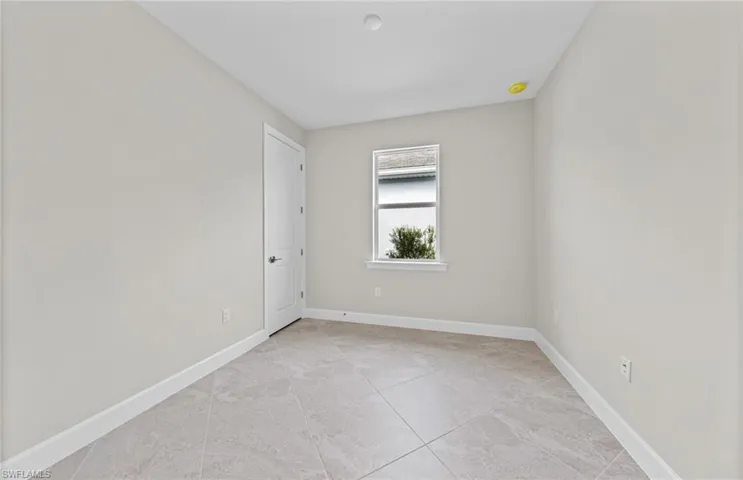 View of tiled spare room