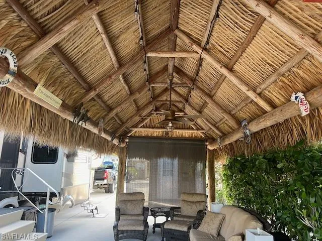 View of patio / terrace featuring a gazebo, outdoor lounge area, and ceiling fan