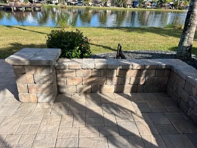 View of patio / terrace with a water view