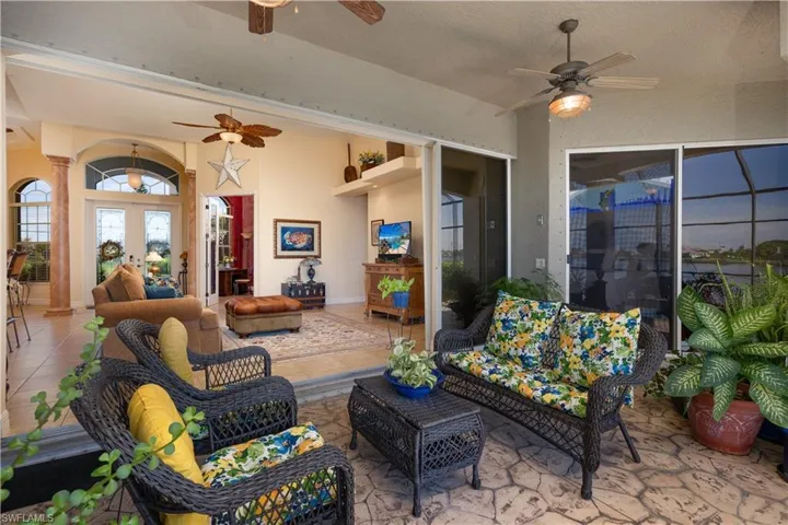 View of patio / terrace featuring ceiling fan and an outdoor hangout area