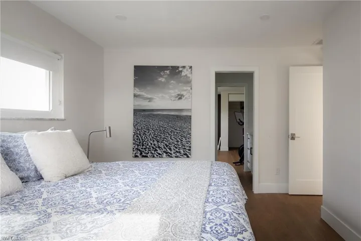 Bedroom featuring dark hardwood / wood-style flooring
