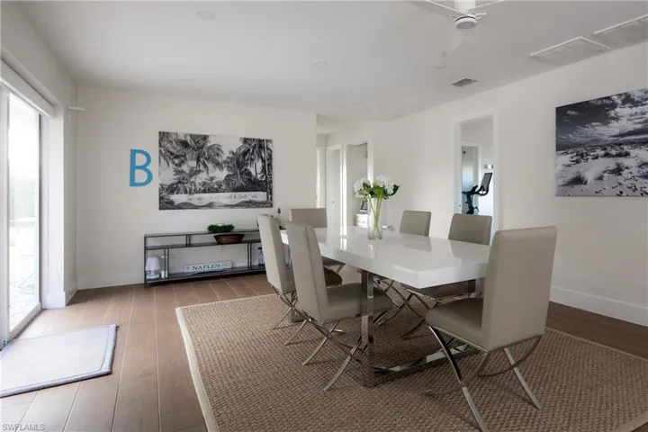 Dining space featuring hardwood / wood-style flooring