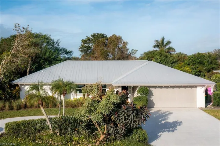 Single story home featuring a garage