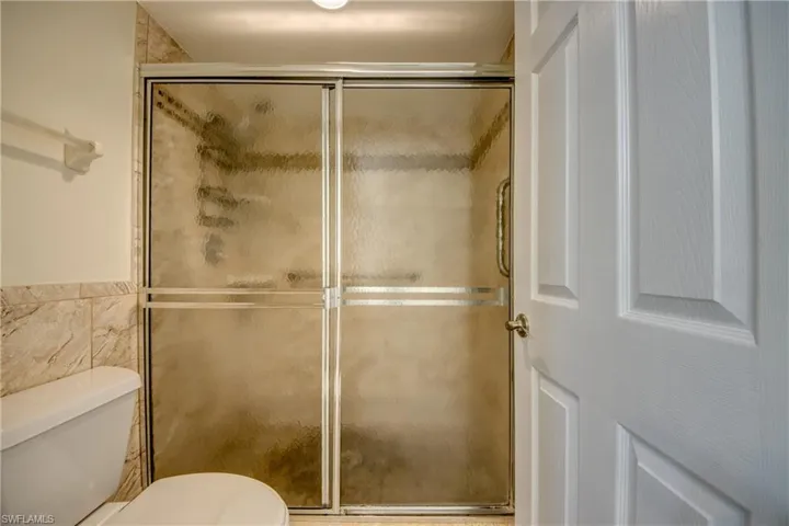 Large, tiled walk-in shower