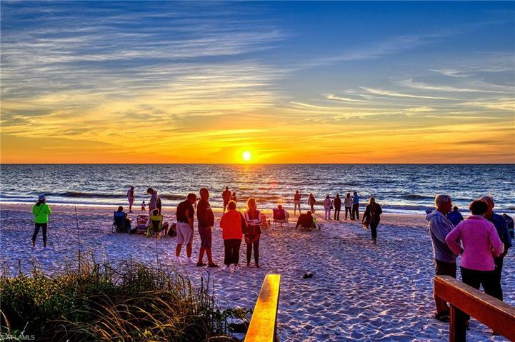 Sunset on the beach outside of Surfsedge 206 prior to Hurricane Ian.  Walkway is being rebuilt.