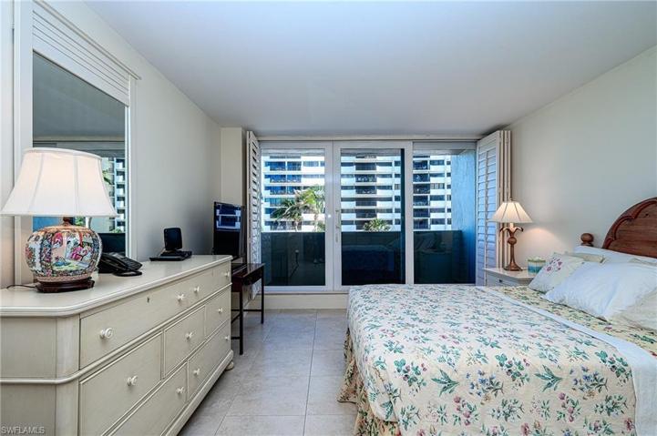 Master bedroom has gulf views  to the west and access to the spacious lanai