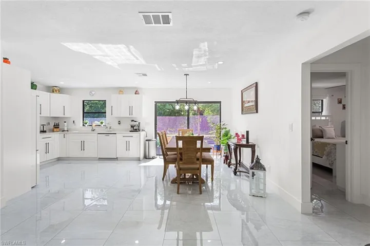 Dining room featuring baseboards and visible vents
