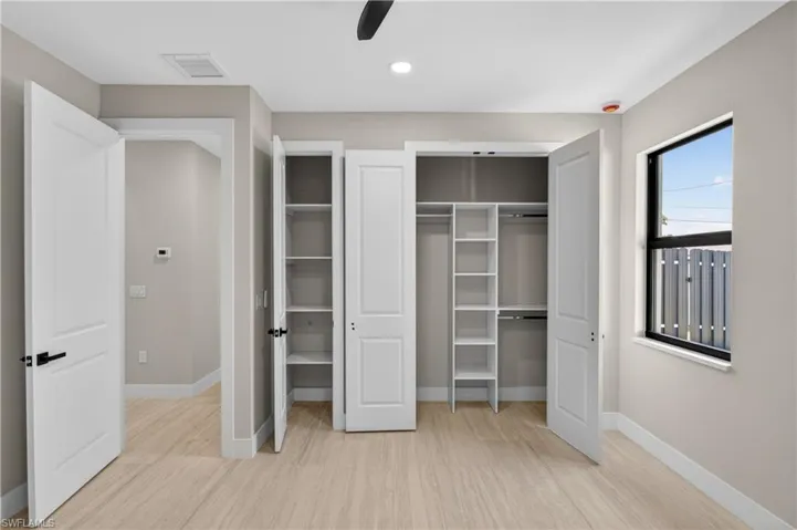 3rd Guest Bedroom - CUSTOM CLOSET CABINETRY provides stylish organization with ample storage for a luxurious everyday experience!