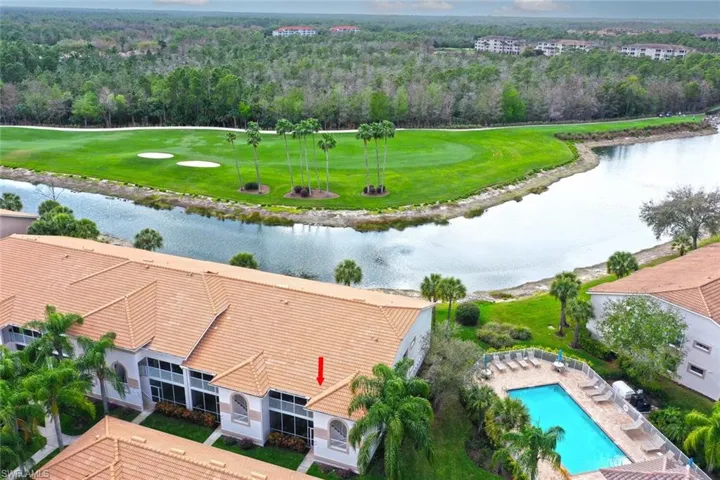 Bird's eye view of a nearby body of water and a local golf course
