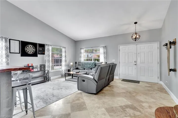 Front living room showing the entry doors