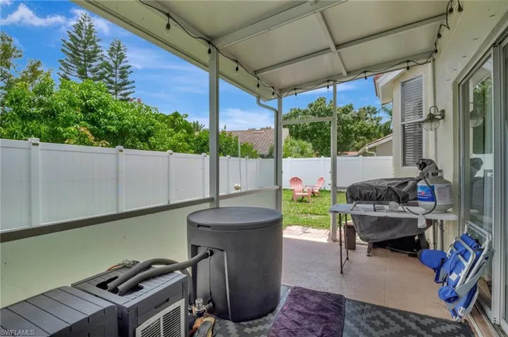 The privately fenced yard makes the perfect backdrop for a family gathering