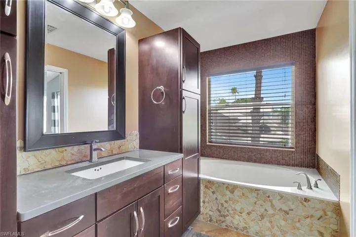 Primary bathroom showing separate tub