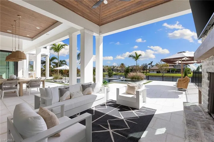 View of patio / terrace with ceiling fan and outdoor lounge area