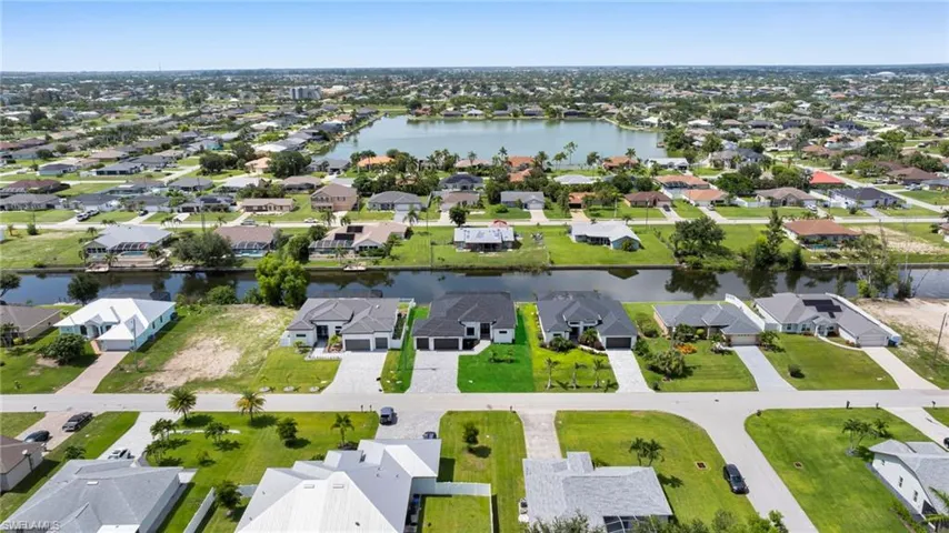 Aerial view of residential area with a large body of water