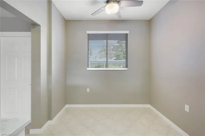 Unfurnished room featuring ceiling fan