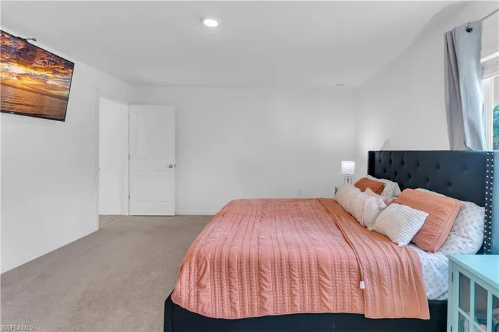 Bedroom with carpet flooring