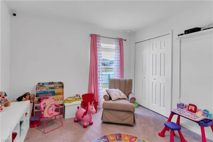 Playroom featuring carpet floors