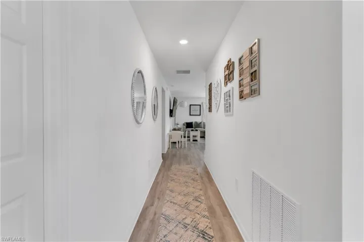 Hallway featuring light hardwood / wood-style floors