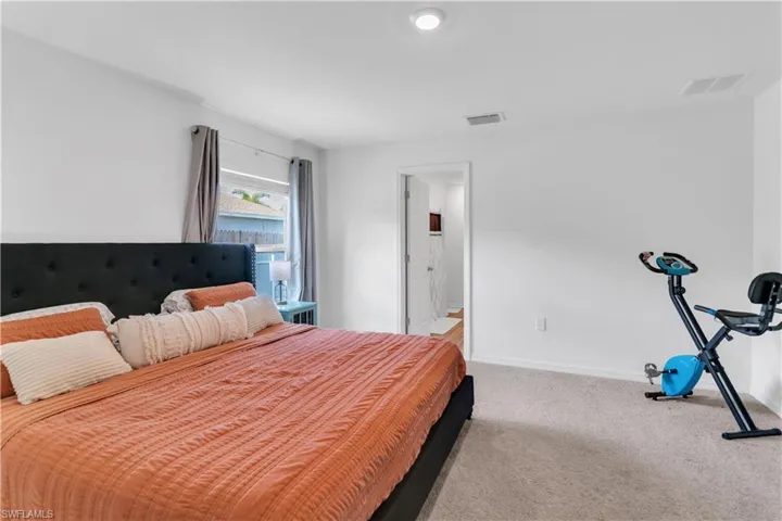 Bedroom featuring light