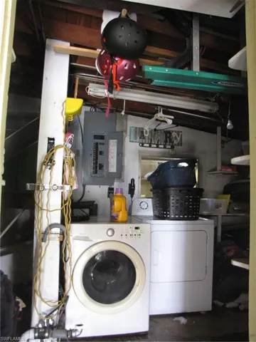 Clothes washing area with electric panel and washer and dryer