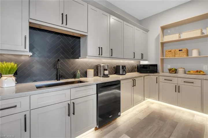 Walk-in Butlers Pantry with custom Pull out appliance shelves, 2nd dishwasher and sink