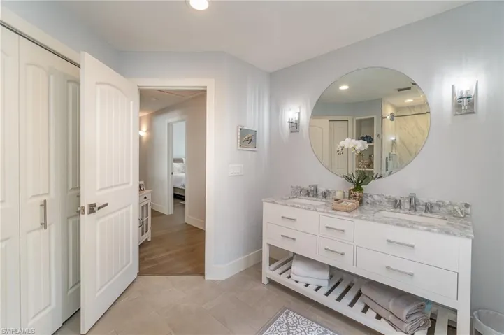Bathroom with vanity and hardwood / wood-style floors