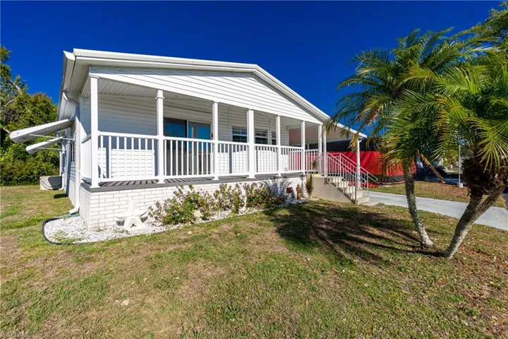 View of grassy yard featuring a water view