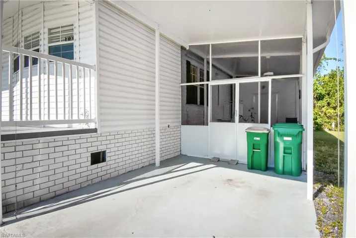 View of patio / terrace with a sunroom