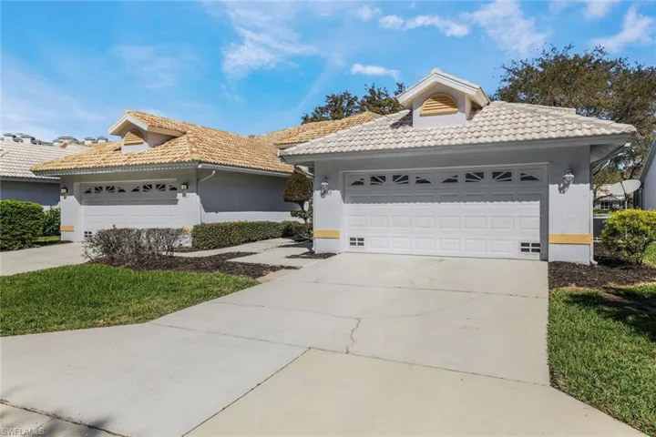 Twin villa with 2 car garage for storage!