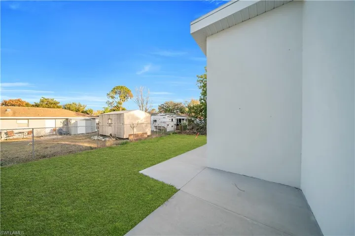 View of fenced backyard