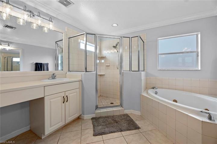 Master bath with dual sinks, makeup area