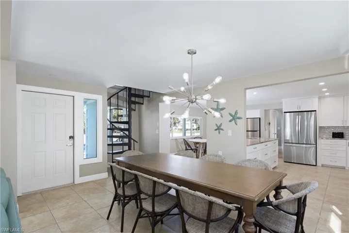 Comfortable dining space adjacent to the kitchen  - Virtually Edited Image