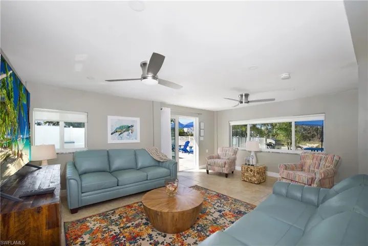 Spacious living area with ample natural light - Virtually Edited Image
