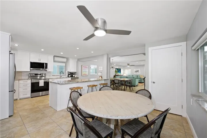 Open dining area ideal for entertaining - Virtually Edited Image