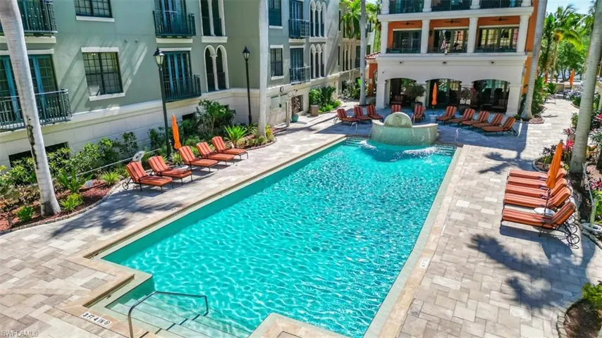 Community pool with a patio area