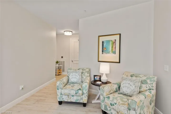 Living area with light wood finished floors
