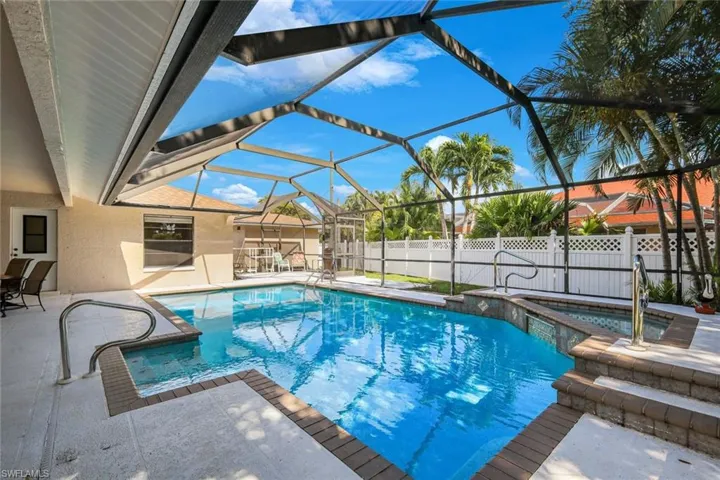Pool & Spa under vaulted screen w afternoon sun
