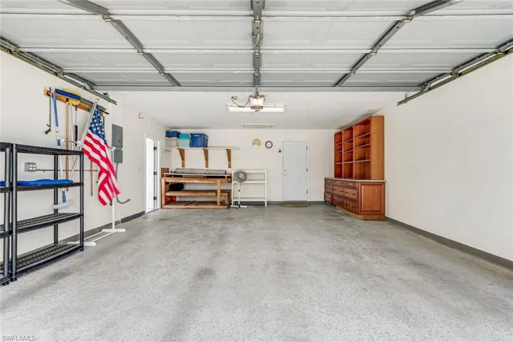Extended 2Car, Built-In Cabinetry, 2 workbenches & epoxy sealed floor