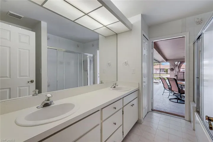 Pool Bath with Dual Sinks and Shower/Tub combo