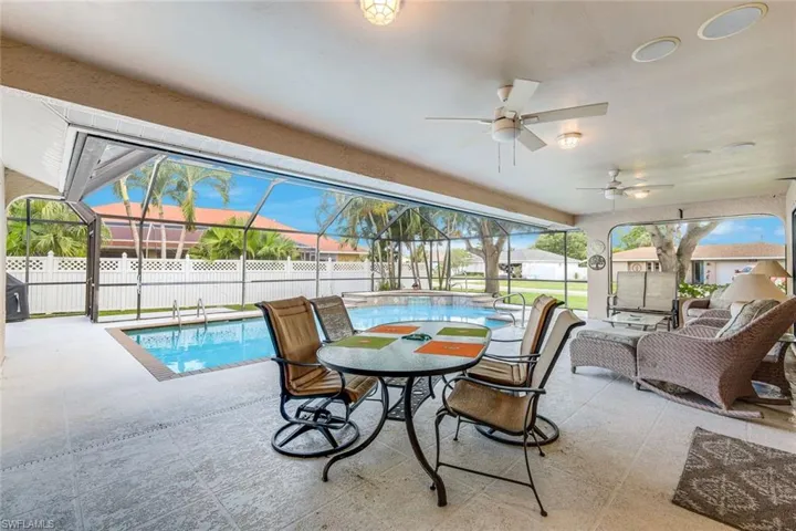 Under-Truss Outdoor Living w Dining & Relaxing Space for Everyone!