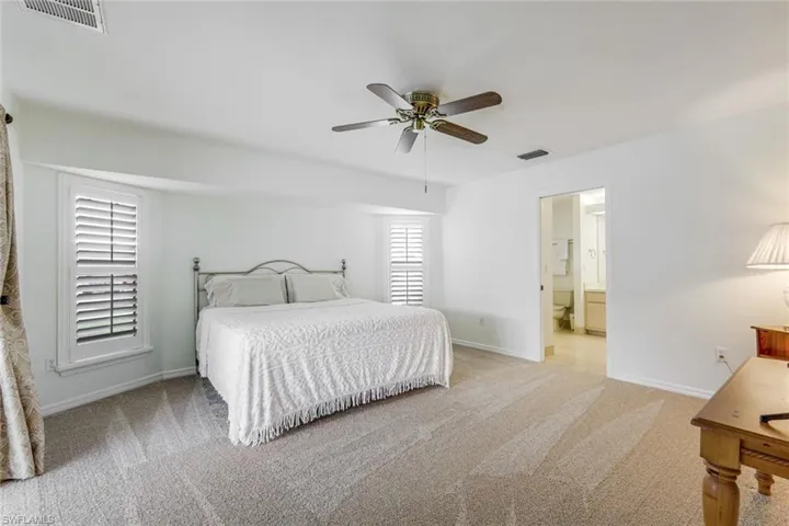 Extended Primary Bedroom w King Bed and fresh carpet