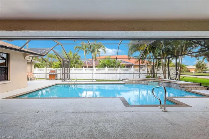 So Much Outdoor Lanai Space w Grill & Sun Deck in far left