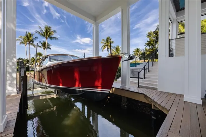 Dock featuring boat lift