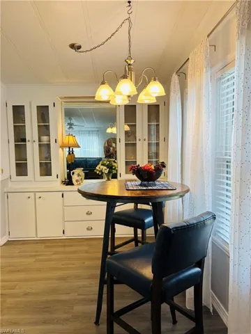 Dining room with light wood-style flooring