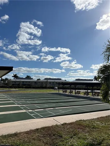 View of community featuring shuffleboard