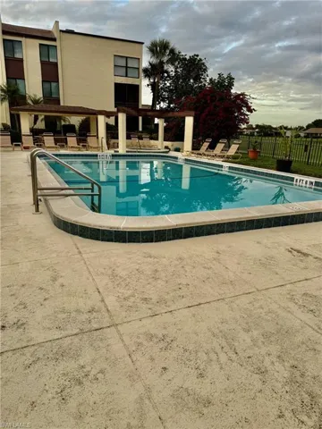 Community pool featuring a patio area