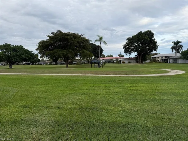 View of home's community featuring a lawn and a gazebo