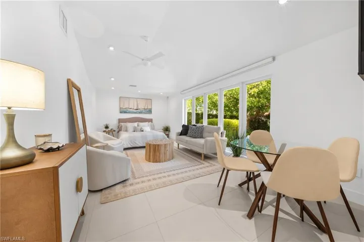 Bedroom featuring recessed lighting, light tile patterned floors, and a ceiling fan