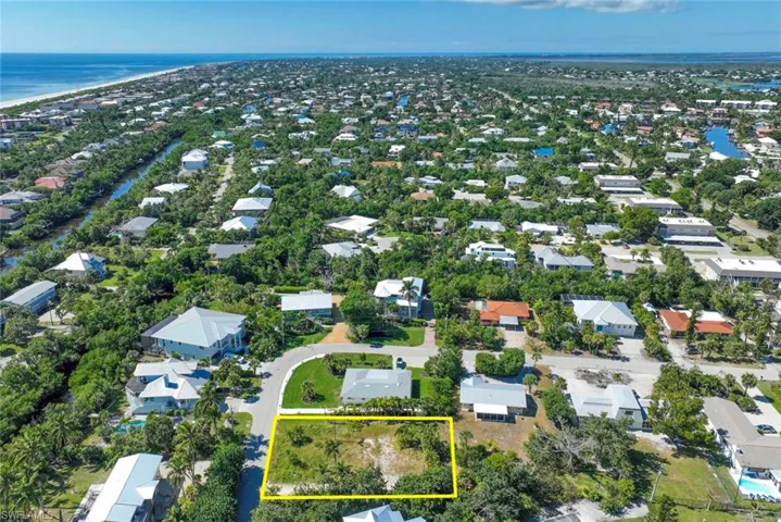 View of property location featuring a large body of water and property boundaries highlighted